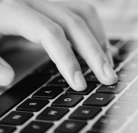 Fingers typing on a keyboard